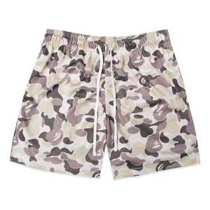 Shorts de basket-ball personnalisés pour hommes, double couche, en maille, avec logo du fabricant, impression par sublimation sur polyester de haute qualité, entrejambe de 5 pouces - Product Image 1