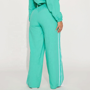 Ensemble de survêtement en nylon fabriqué en usine, coupe-vent personnalisé, sweat à capuche et pantalon de jogging, deux pièces, tenue décontractée tendance, vente en gros OEM - Product Image 2
