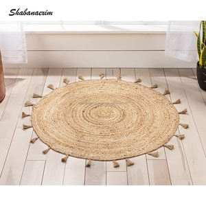 Alfombra redonda de Yute natural al por mayor, alfombra decorativa trenzada hecha a mano para sala de estar con juegos de alfombras con borlas - Product Image 1
