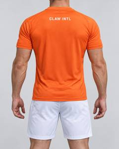 เสื้อฟุตบอลแขนสั้นสีส้มสำหรับผู้ชาย Claw Intl ระบายอากาศได้ดี ทรงพอดีตัว คอกลม มีโลโก้ด้านหลัง - Product Image 6