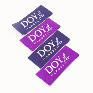 Étiquettes tissées en damassé OEM 2026 haute densité avec logo personnalisé et bords thermosoudés pour T-shirts - Product Image 2
