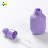 Fournisseur OEM Nouveau Design 20mm Violet Forme de boule en plastique Col en silicone moulé par injection pour pipette Bouchon compte-gouttes