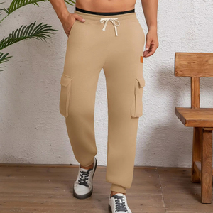 Pantalon de survêtement ajusté pour homme de qualité supérieure avec poches latérales et cordon de serrage à la taille, idéal pour le sport ou le style urbain - Product Image 1