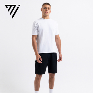 เสื้อยืดโอเวอร์ไซส์สีขาวแบบเรียบ ผ้าฝ้าย 100% ทรงหลวมไหล่ตก น้ำหนัก 240 GSM สไตล์สตรีทแวร์ ทรงบ็อกซี่ - Product Image 1