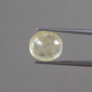 พลอยแซฟไฟร์สีเหลืองธรรมชาติแบบเม็ดเดี่ยว |   รูปไข่ขนาด 11x10 มม. น้ำหนัก 7.22 กะรัต |   เครื่องประดับที่ผ่านการเคลือบแว็กซ์/น้ำมันเปลี่ยนสีได้ ได้รับการรับรองจาก IGI - Product Image 3