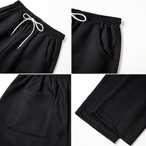 Pantalon de jogging streetwear noir uni personnalisé pour homme et unisexe, coupe ample et décontractée, taille élastique avec cordon de serrage, haute qualité - Product Image 2