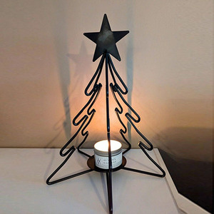 Charming Black Metal <b>Christmas</b> Tree Candle Holder Topped With A <b>Star</b> For Festive Holiday Table Decor And Warm Seasonal <b>Lighting</b> - Product Image 1