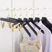 Porte-vêtements en bois, métal, fer, plastique, noir, simple ou double niveau, avec logo personnalisé, pour pantalons et magasins de vêtements, monophasé