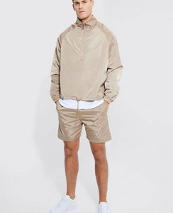 เสื้อแจ็กเก็ตกันลมโอเวอร์ไซส์แบบสวมหัวสำหรับผู้ชายเสื้อกันลมมีซิปกันน้ำสำหรับเล่นกีฬายิม - Product Image 1