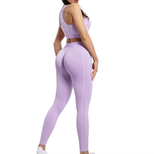 ชุดโยคะสีม่วงสำหรับผู้หญิง กางเกงเลกกิ้งเอวสูงและเสื้อชั้นในแบบ Racerback ชุดออกกำลังกายไร้รอยต่อ 2 ชิ้น ลายเรียบแบบเต็มตัว - Product Image 2