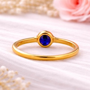 Bague délicate minimaliste chrétienne bohème en or 18 carats plaqué or avec saphir bleu ovale créé en laboratoire, bijoux faits à la main en pierres précieuses pour femme - Product Image 2