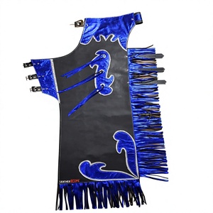 Pantalones de rodeo occidentales personalizados con borlas decorativas, cintura media, sin mangas, detalles metálicos azules, patrón geométrico frontal, unisex - Product Image 1