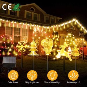 Set di 5 Luci Solari Decorative Natalizie Impermeabili: Renne, Fiocchi di Neve, Campanelle, Albero di Natale e Babbo Natale - Product Image 6