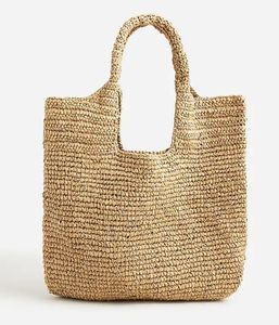 Stay fashionable and polished with this lightweight Natural yarn <b>bag</b> tailored with a distinctive leather strap for looks - Product Image 3