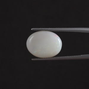 โอปอลธรรมชาติสีขาวรับรองโดย IGI น้ำหนัก 4.76 กะรัต รูปทรงวงรี ขนาด 15x11.5 มม. ผ่านการเคลือบแว็กซ์/น้ำมัน คุณภาพดี จากอินเดีย - Product Image 1