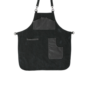 Tablier de coiffure professionnel en toile noire durable avec plusieurs poches pour barbiers et stylistes - Product Image 1
