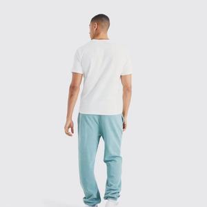Pantalon de jogging cargo pour homme en toile de coton respirante bleu clair, avec cordon de serrage, taille élastique, poids moyen et poches latérales - Product Image 2