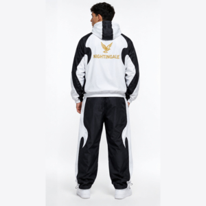 Conjunto de 2 piezas de pantalones deportivos softshell con cremallera personalizados para hombre, con ribetes elásticos en las puños, chándal unisex de nailon con bloques de color y cortavientos. - Product Image 4