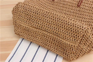 Upgrade your accessory collection with this premium Natural yarn bag designed with a classic open <b>top</b> and slender leather handle - Product Image 4