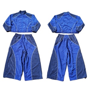 Conjuntos Deportivos Transpirables Personalizados para Hombre con MOQ Bajo, Chaqueta Cortavientos y Pantalones Jogger de Dos Piezas, Chaquetas Cortavientos para Hombre de Alta Calidad - Product Image 1