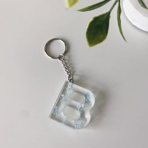 Nouveauté, porte-clés en résine très vendu, porte-clés cadeau, prix de gros, porte-clés pour couples, personnalisation du logo au laser - Product Image 5