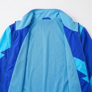Veste coupe-vent réfléchissante personnalisée pour la course à pied, le cyclisme et les sports de plein air avec marquage personnalisé Fabricant OEM ODM - Product Image 3