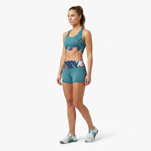 Ensemble soutien-gorge de sport et short à imprimé abstrait bleu sarcelle avec design dos croisé - Product Image 1