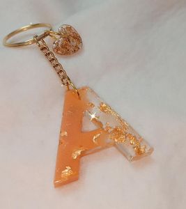 Good Quality Resin keychain Gift <b>Key</b> <b>Ring</b> At Wholesale Price Couples Keychain Laser Laser logo Keychain <b>Customization</b> - Product Image 6