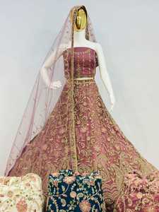 Lehenga Choli de Novia de Lujo, Confeccionado con Detalles Intrincados en Tela de Red, Piedras Decorativas y una Elegante Silueta Evase - Product Image 3