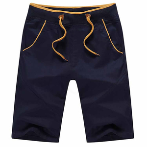 Pantalones cortos tipo bermuda de algodón de color liso para hombre con cordón en la cintura y bolsillos, estilo casual, corte de tiro medio - Product Image 1