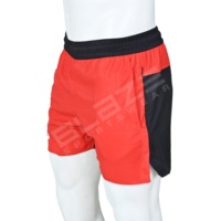 Shorts de sport pour homme 2-en-1 rouge et noir, imperméables, à séchage rapide, avec poches, taille élastique, mi-longs, pour l'entraînement et la course à pied