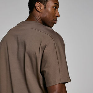 T-shirt anti-rides d'été à manches courtes, couleur unie, épaules tombantes, en coton respirant, confortable et à séchage rapide, vente en gros - Product Image 4