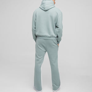 Conjunto de dos piezas de sudadera con capucha y pantalones deportivos para hombre, 100% algodón, diseño sólido con paneles, estilo moderno. - Product Image 5