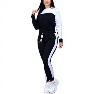 Conjunto Deportivo para Mujer en Blanco y Negro, Cuello Redondo, Manga Larga, Corte Ajustado, Estilo Deportivo con Pantalones con Cordón, Transpirable - Product Image 1