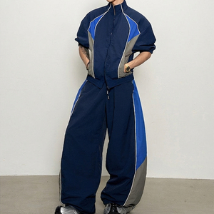 Vente Flash : Ensemble de Survêtement Homme Bleu Marine avec Blocs de Couleurs et Passepoil Blanc, Col Rond, Fermeture Éclair Intégrale, Manches Longues, Coupe Ample et Jambes Larges, Respirant, 2 Pièces - Product Image 1