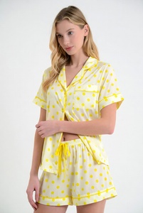 Womens blue star print pajama set with short sleeve button up top and drawstring pants in studio for cute comfortable sleepwear - Product Image 3
