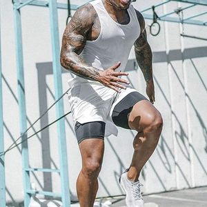 กางเกงขาสั้นกีฬาผู้ชายแบบสองชั้นพร้อมซับใน ระบายอากาศได้ดี 2 in 1 สำหรับออกกำลังกาย วิ่ง และเล่นกีฬา  รับสกรีนโลโก้ - Product Image 3