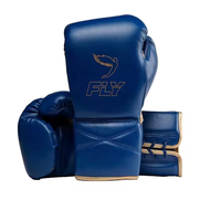 Kit de protection de boxe Fly Boxing Gear en cuir de vache véritable pour entraînement et sparring, comprenant des gants de boxe à lacets, une protection nasale, un protège-tête et un protège-guêtres.