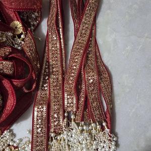 Vibrant Crimson <b>Red</b> Velvet Base Intricate Gold-Toned <b>Sequin</b> Embroidery And Traditional Zari Work Faux Pearl Tassels - Product Image 1