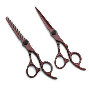 Tijeras de barbero profesionales afiladas de acero inoxidable con hoja curva para diestros, para un corte de pelo impecable. - Product Image 1