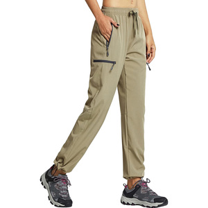 Pantalon de randonnée unisexe en softshell, séchage rapide, résistant à l'eau, avec fermeture éclair, cordon de serrage et poches, coupe classique pour l'été et les activités de plein air - Product Image 1