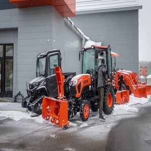 Tractor Kubota de grado industrial equipado con sistema de quitanieves frontal, diseñado para nieve profunda y condiciones exteriores difíciles. - Product Image 2