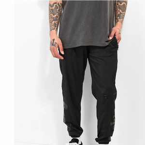 Pantalon coupe-vent personnalisé pour homme, séchage rapide, léger, pour sports de plein air, respirant, pour voyage et randonnée, fabricant OEM ODM - Product Image 1