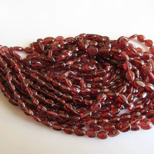 ลูกปัดโกเมนโมซัมบิกขายส่งลูกปัดอัญมณีรูปไข่เรียบอุปกรณ์ทำเครื่องประดับ5เส้น - Product Image 1