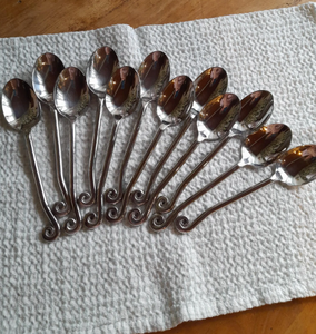 Ensemble de couverts élégants en acier de qualité supérieure avec miroir Ustensiles de salle à manger inspirés des nœuds pour une table moderne - Product Image 1