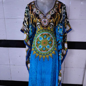 Robe Abaya de Luxe Brodé Teal - Motif Floral Ornamenté sur la Poitrine, Manches Longues Bouffantes, Tenue de Soirée Modeste de Haute Qualité - Product Image 1