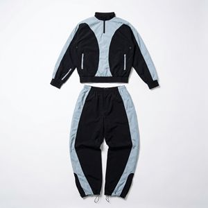 Conjunto de Chándal Cortavientos Personalizado |   Chaqueta Deportiva Ligera de Nailon y Pantalones para Correr |   Fabricante de Ropa Deportiva OEM - Product Image 1