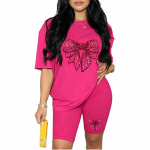 Ensemble 2 pièces rose à sequins et nœud pour femme : T-shirt oversize et short cycliste assorti – Tenue décontractée et streetwear - Product Image 1