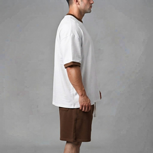 Conjunto deportivo de secado rápido OEM, transpirable, de manga corta, cómodo, de dos tonos, camiseta y pantalones cortos de corte holgado, chándal para hombre. - Product Image 5