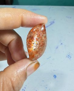 Pierre précieuse naturelle en cabochon de pierre de soleil orange, avec éclat doré et jeu de couleurs, pour bagues, pendentifs et conception de bijoux haut de gamme - Product Image 1